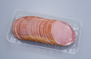 Muovirasia, jossa ohuita kinkkuviipaleita siistissä pinossa harmaalla taustalla.